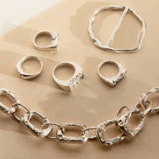 Recycled silver statement chain and chunky rings by Jo Wood and recycled silver bridal hair pin by Ara the altar