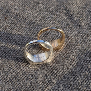 The Hewn signet rings by Lunaflux inside ring.