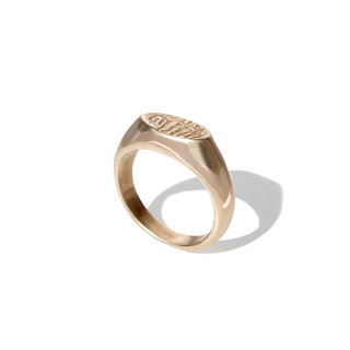 The Lamina signet ring in brass handcrafted by Lunaflux on a white background.