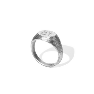 Sterling silver the Melt signet ring by Lunaflux on a white background.