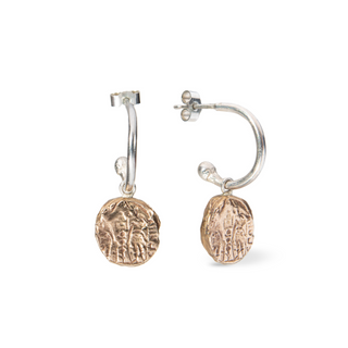 Lamina drop earrings in brass and sterling silver handcrafted by Lunaflux on a white background.