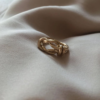 Gold plated Double Rope ring by Claire Hibon made from reused and recycled material.
