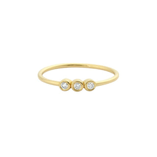 Recycled yellow gold ring with three diamonds in a row