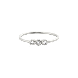 Recycled white gold ring with three diamonds in a row