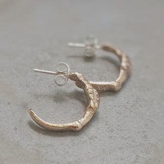 Recycled brass midi hoop earrings with an organic surface by Lunaflux.