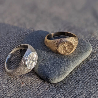 Brass and sterling silver signet rings by Lunaflux.