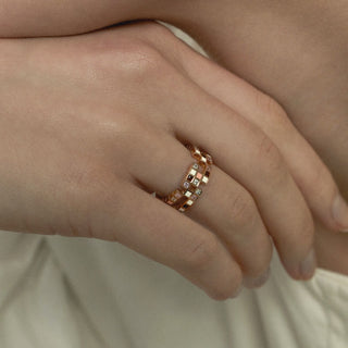 Model wearing chunky statement Chichi ring by EDXU in recycled 18ct rose gold