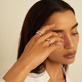 Model wearing recycled 18ct rose gold contemporary tetris stacking ring