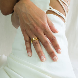 Model wearing recycled 18ct yellow gold contemporary tetris stacking ring